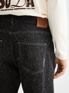 The Pitch Loose  Jeans — Black Snow detail shot of fabric and craftsmanship by Scotch & Soda