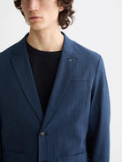regular-fit-unconstructed-cotton-blend-seersucker-blazer detail shot by Scotch & Soda