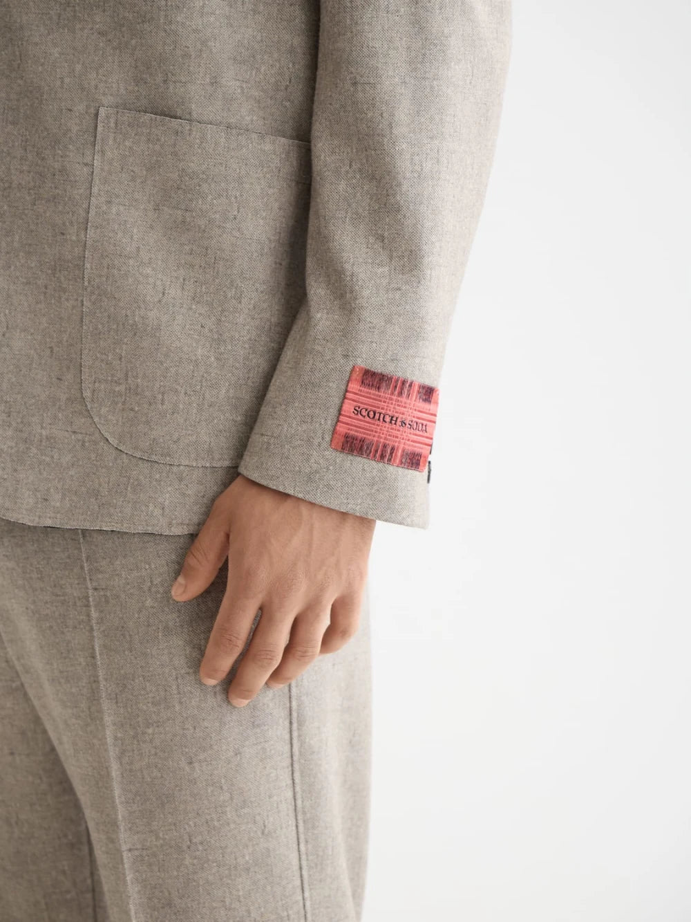 unconstructed-melange-jersey-relaxed-fit-blazer detail shot by Scotch & Soda