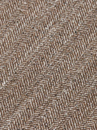 herringbone-yarn-dyed-pleated-baggy-fit-chino detail shot by Scotch & Soda