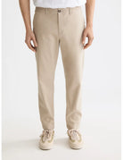 Drift Chino Pants close-up on model showing fit and detail by Scotch & Soda