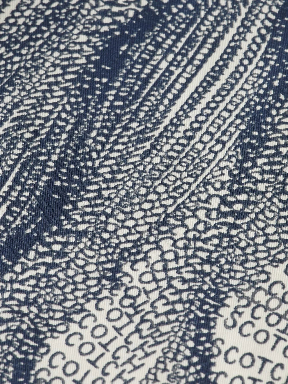 printed-tencel-regular-fit-bermuda-short detail shot by Scotch & Soda