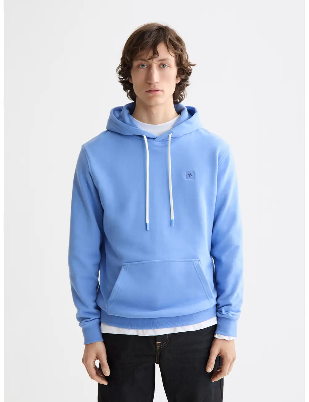 Logo Badge Hoodie close-up on model showing fit and detail by Scotch & Soda