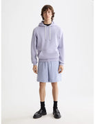 Logo Badge Hoodie full model shot showing overall fit by Scotch & Soda