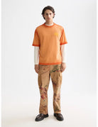 Loose Fit Tee close-up on model showing fit and detail by Scotch & Soda