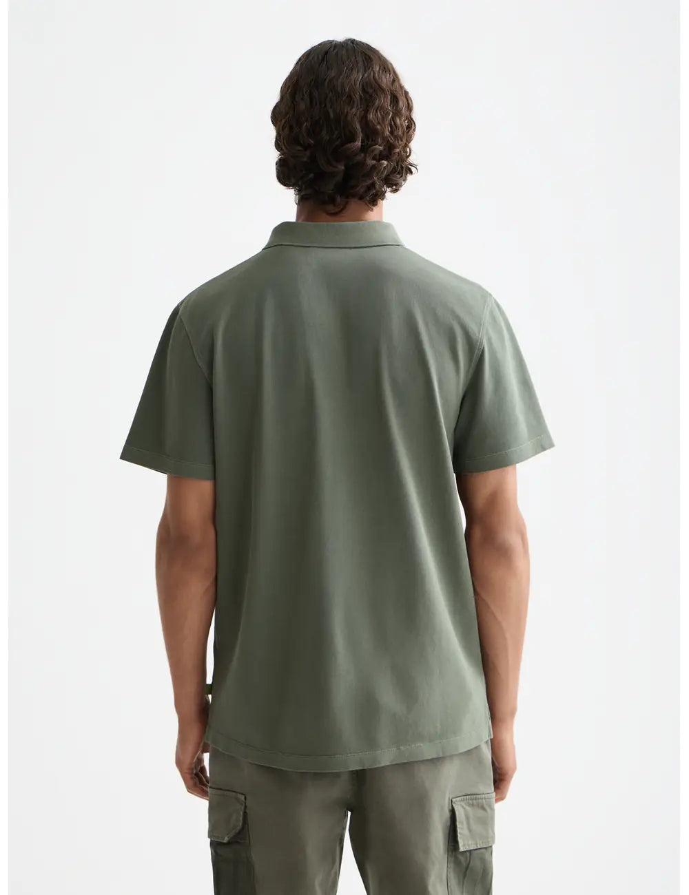 Pique Relaxed Polo detail shot showing fabric and craftsmanship by Scotch & Soda