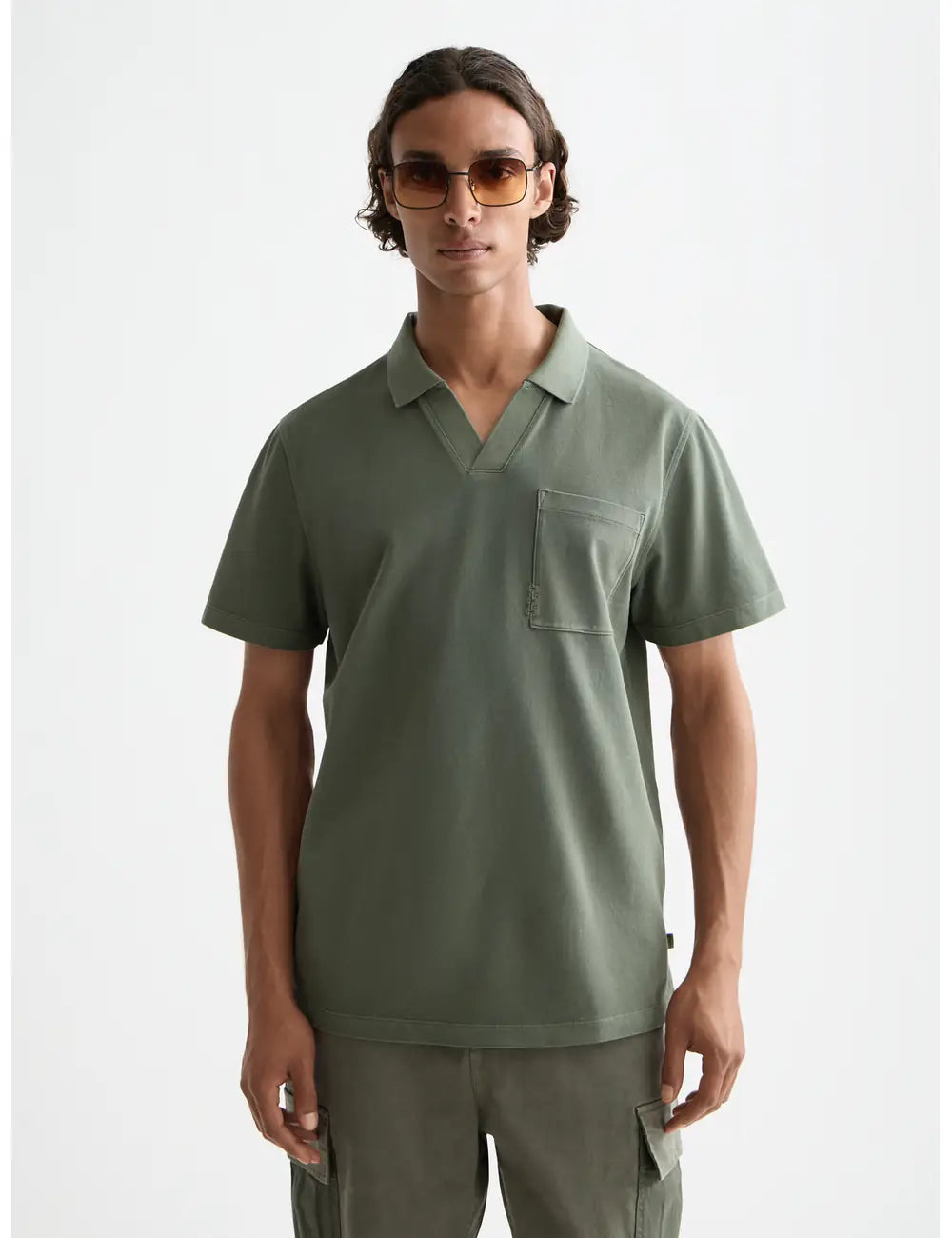 Pique Relaxed Polo close-up on model showing fit and detail by Scotch & Soda