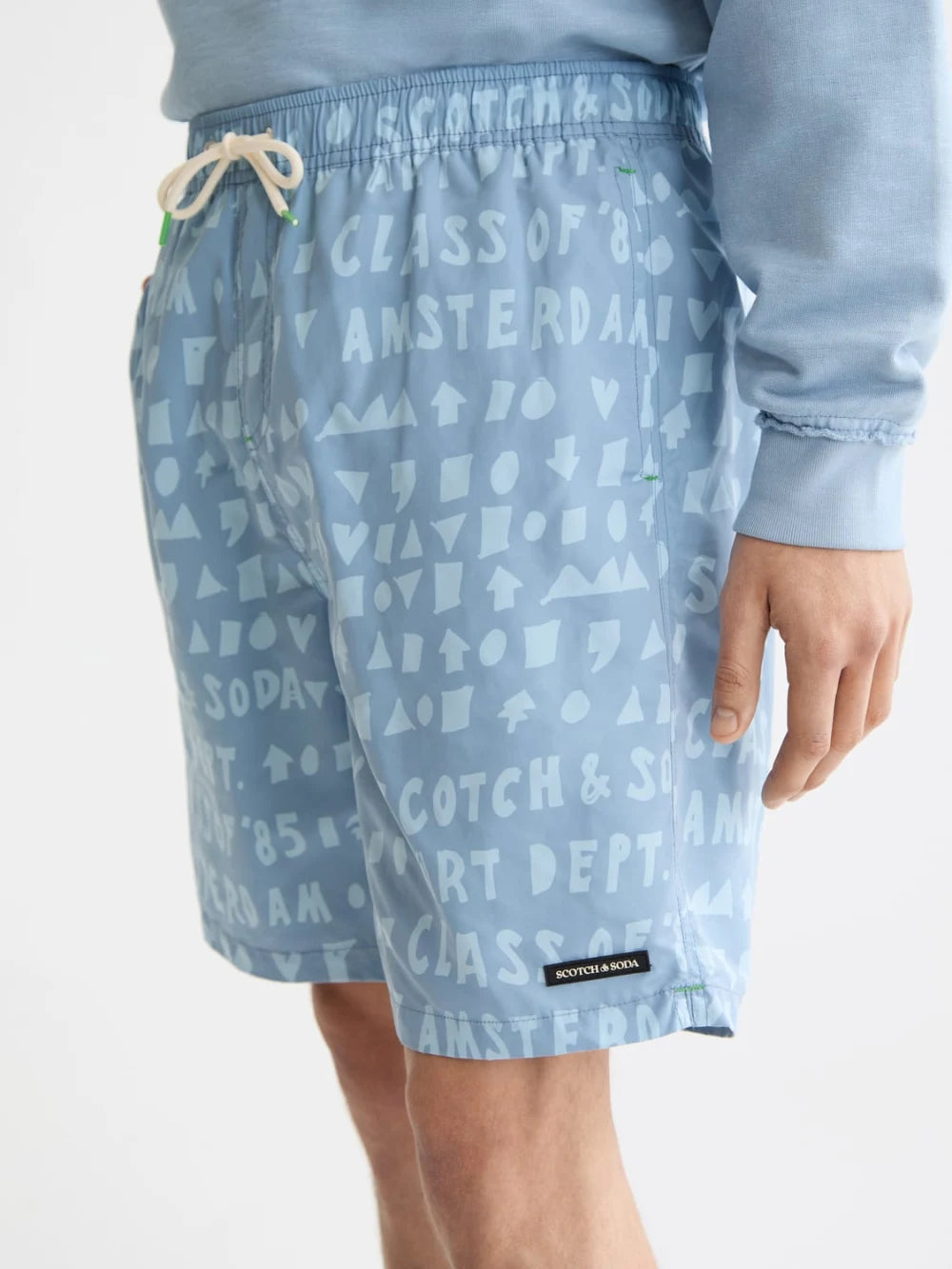 printed-longer-length-swim-shorts detail shot by Scotch & Soda