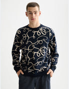Aop Sweatshirt close-up on model showing fit and detail by Scotch & Soda