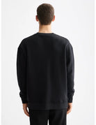 Loose Fit Sweatshirt detail shot showing fabric and craftsmanship by Scotch & Soda