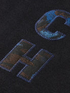 loose-fit-applique-sweatshirt detail shot by Scotch & Soda