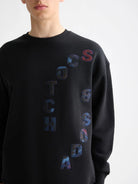 loose-fit-applique-sweatshirt detail shot by Scotch & Soda