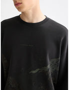 Loose Fit Overdyed AW Sweat-shirt detail shot of fabric and craftsmanship by Scotch & Soda