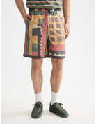 Patchwork Cotton Bermuda close-up on model showing fit and detail by Scotch & Soda