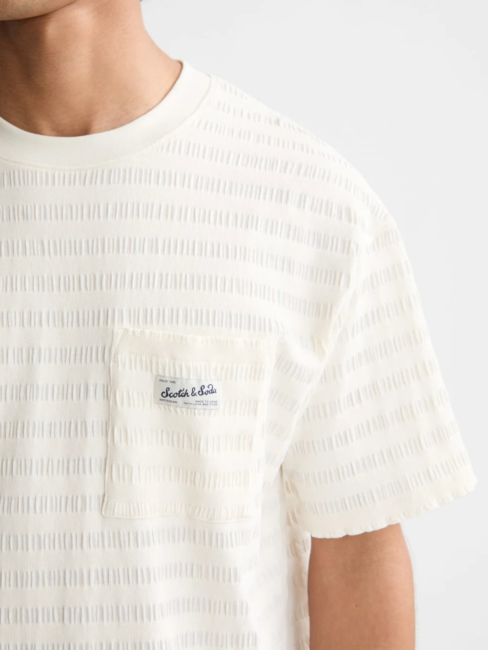relaxed-fit-horizontal-textured-t-shirt-1 detail shot by Scotch & Soda