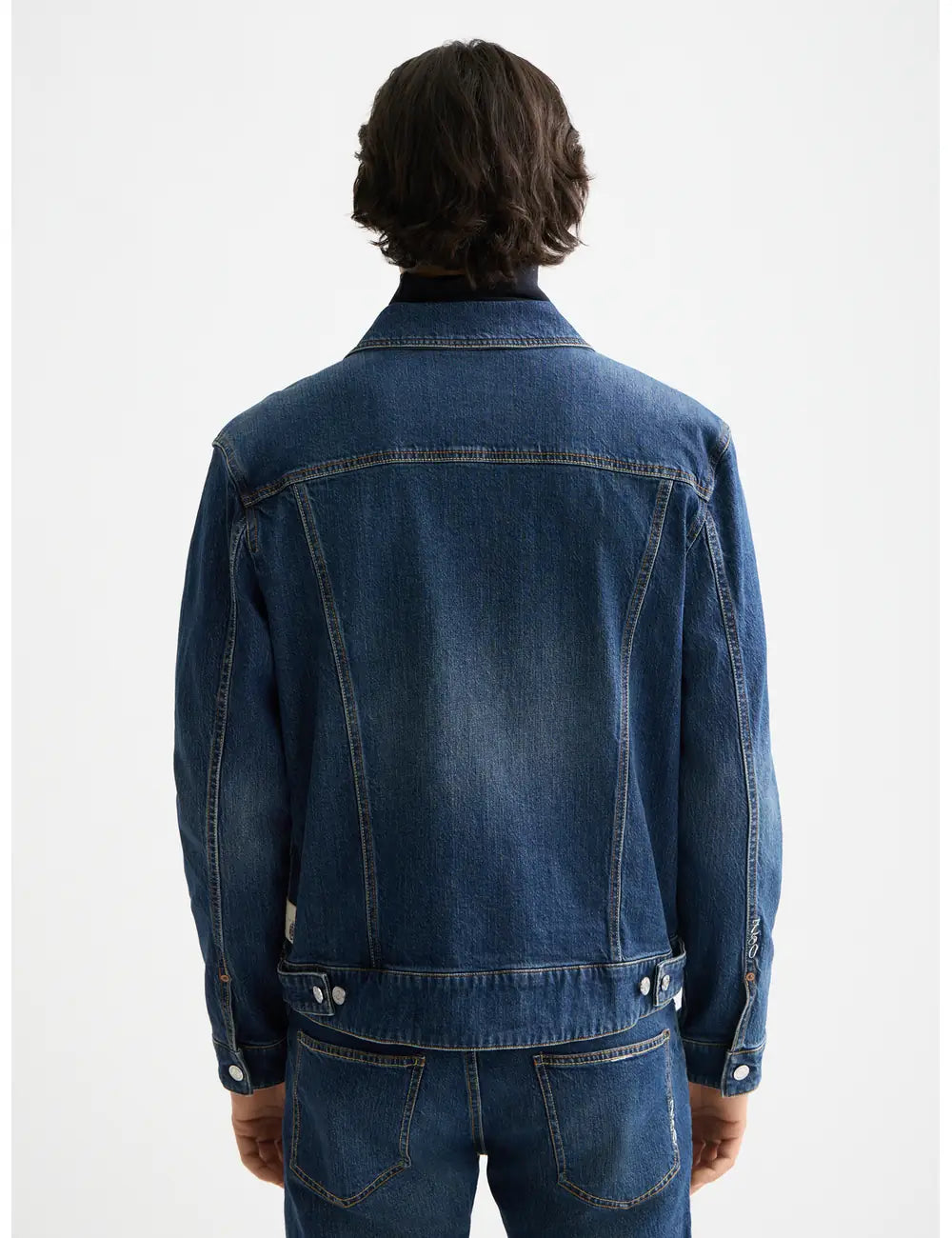 Denim Trucker Jacket detail shot showing fabric and craftsmanship by Scotch & Soda