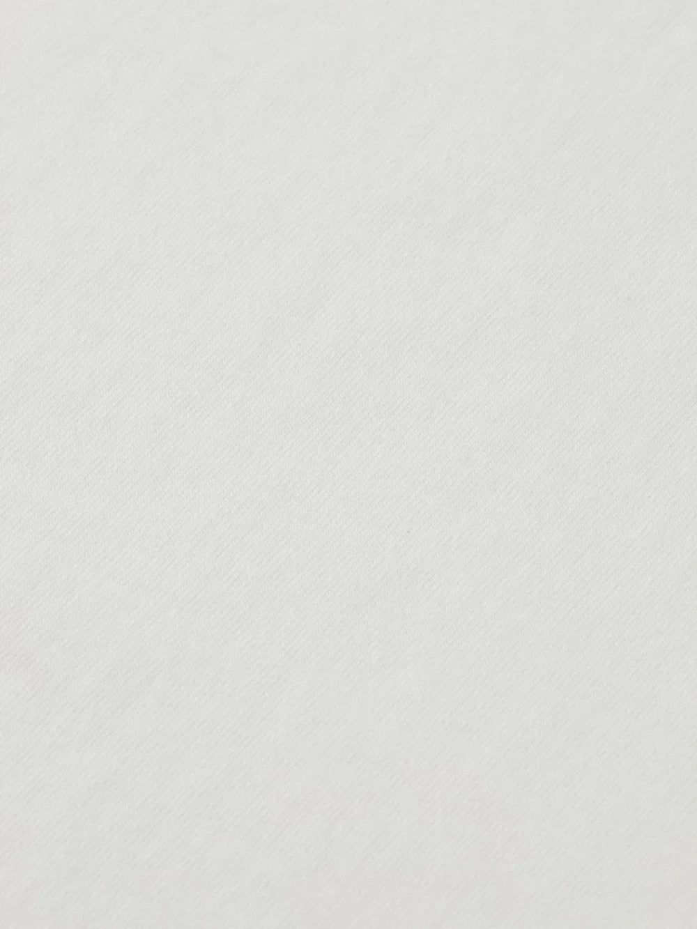 raw-edge-t-shirt detail shot by Scotch & Soda