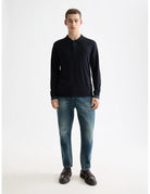 Knitted Long Sleeve Polo full model shot showing overall fit by Scotch & Soda