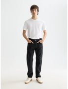 Core The Zee Straight Jeans — City Black front view showing fit and finish by Scotch & Soda