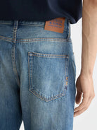 Core Dean Loose Tapered Jean — Blue Nights (Navy) detail shot of fabric and craftsmanship by Scotch & Soda