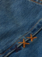 Core Dean Loose Tapered Jean — Blue Nights (Navy) detail shot of fabric and craftsmanship by Scotch & Soda