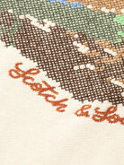 loose-fit-embroidered-artwork-hoodie detail shot by Scotch & Soda