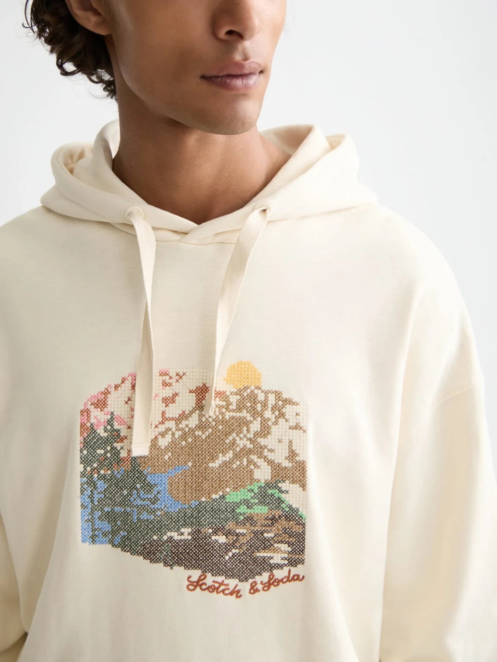 loose-fit-embroidered-artwork-hoodie detail shot by Scotch & Soda