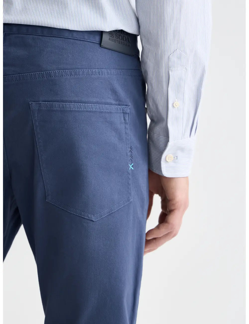 Ralston Stretch Cotton-twill 5-pocket Pant detail shot of fabric and craftsmanship by Scotch & Soda