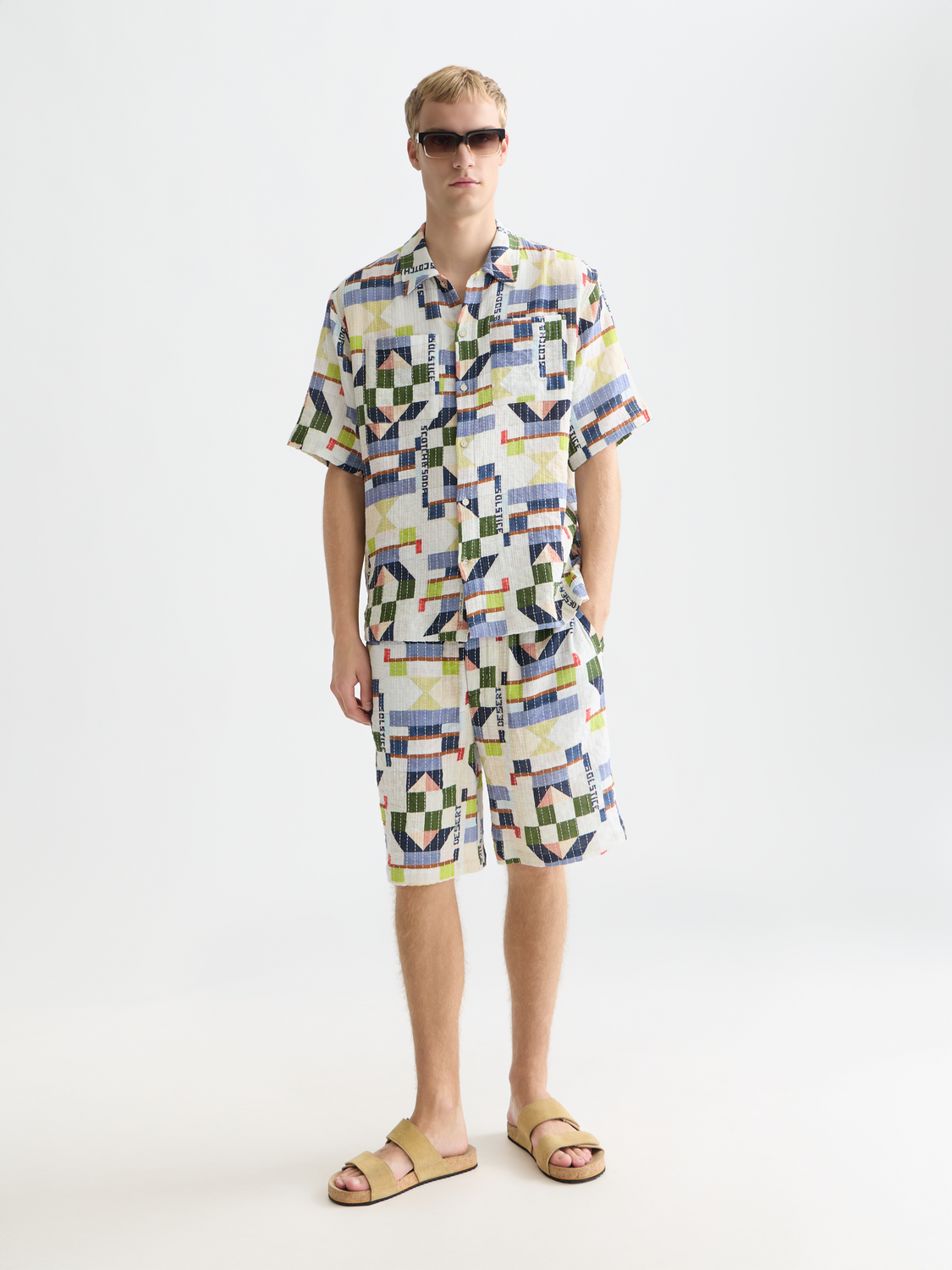 stitched printed cotton relaxed bermuda shorts