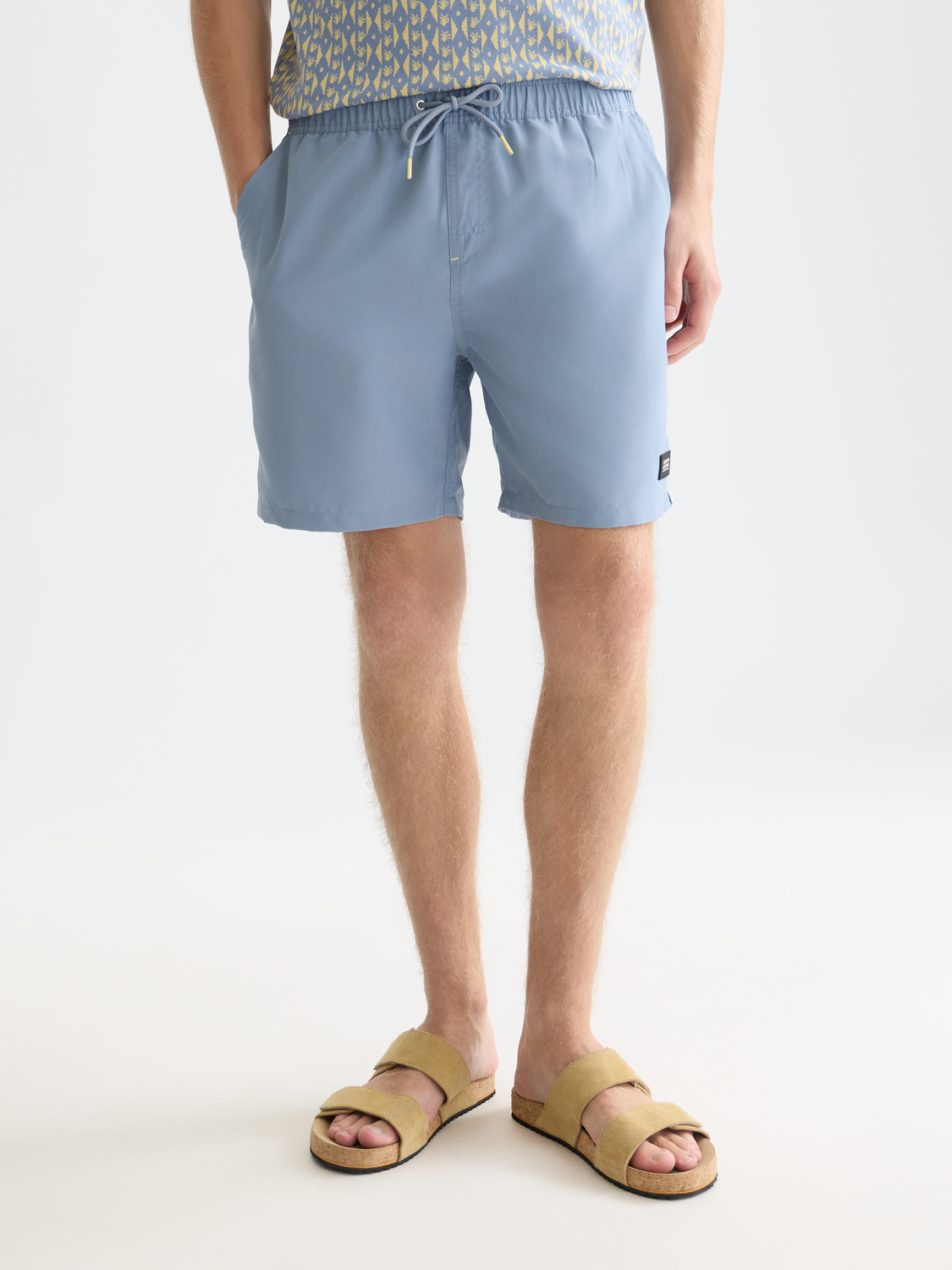 Solid midlength swim shorts