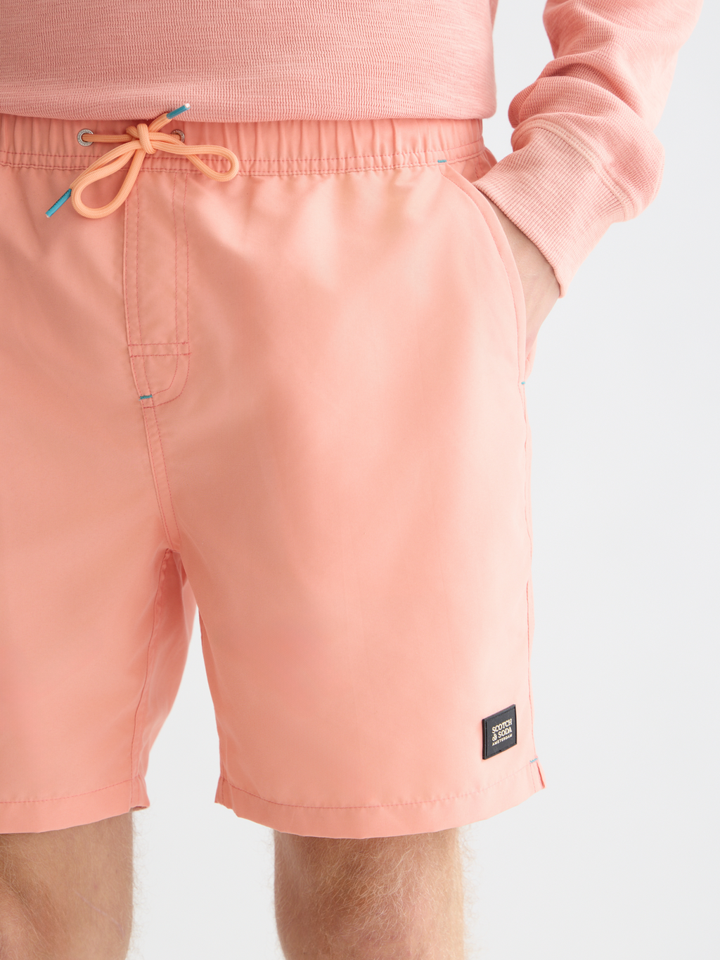 Solid midlength swim shorts