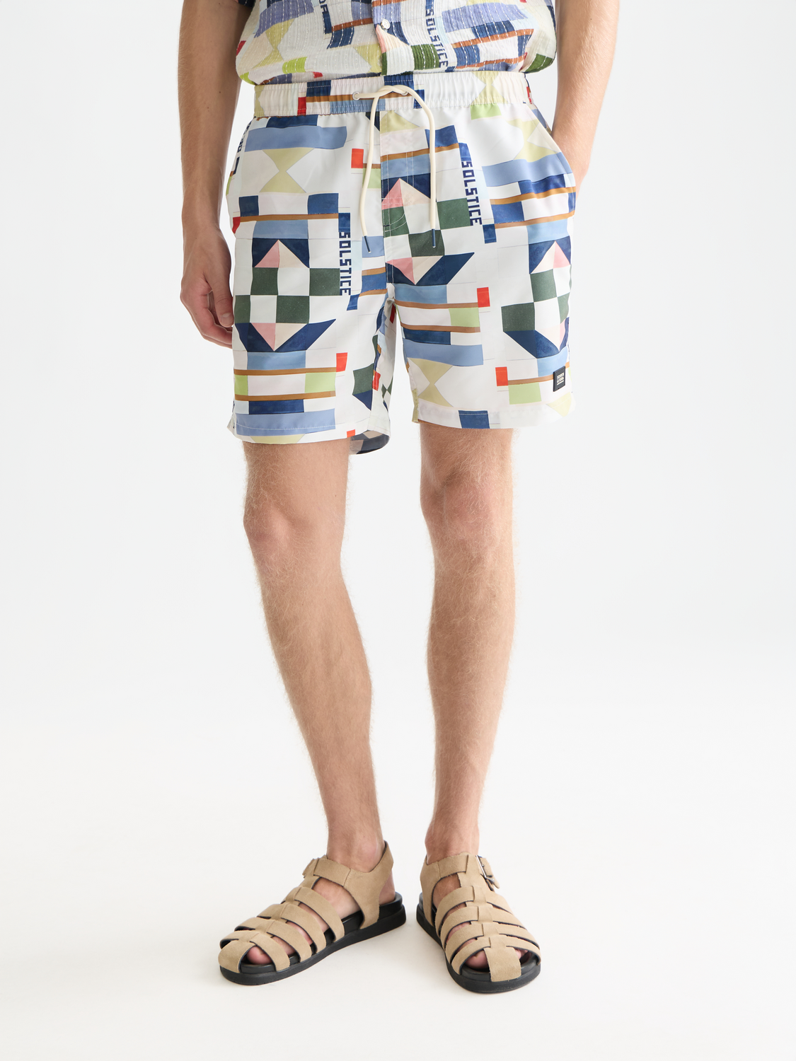 Printed mid-length swim shorts