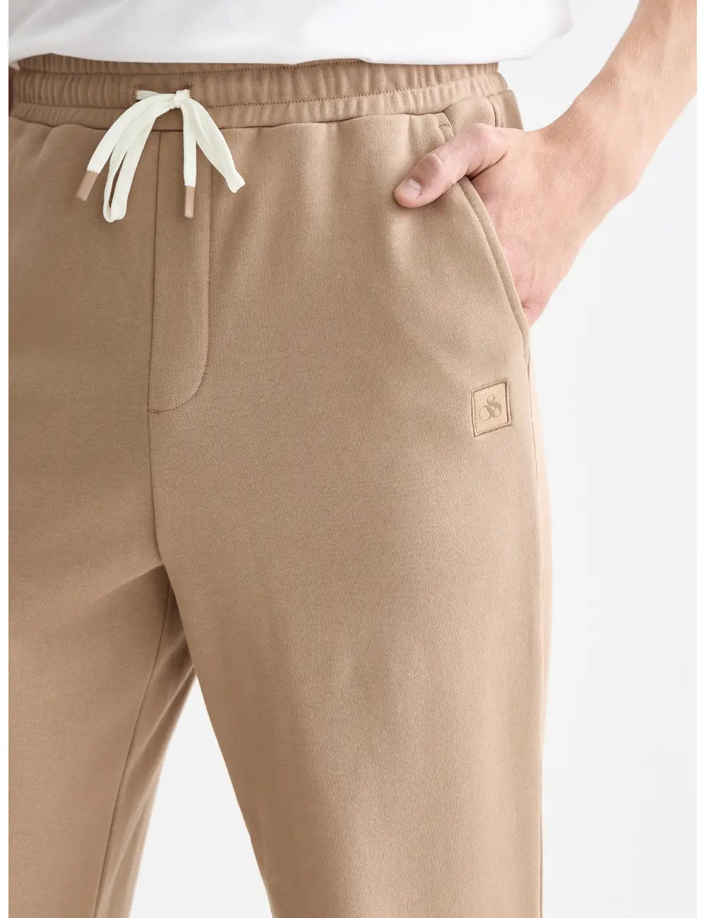 Seasonal Core Logo Badge Regular-fit Sweatpants detail shot of fabric and craftsmanship by Scotch & Soda