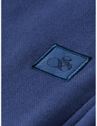 Seasonal Core Logo Badge Regular-fit Sweatpants detail shot of fabric and craftsmanship by Scotch & Soda