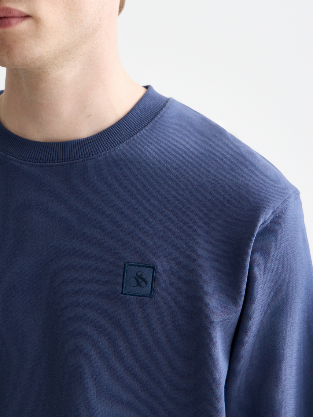 Seasonal Essentials logo badge sweatshirt