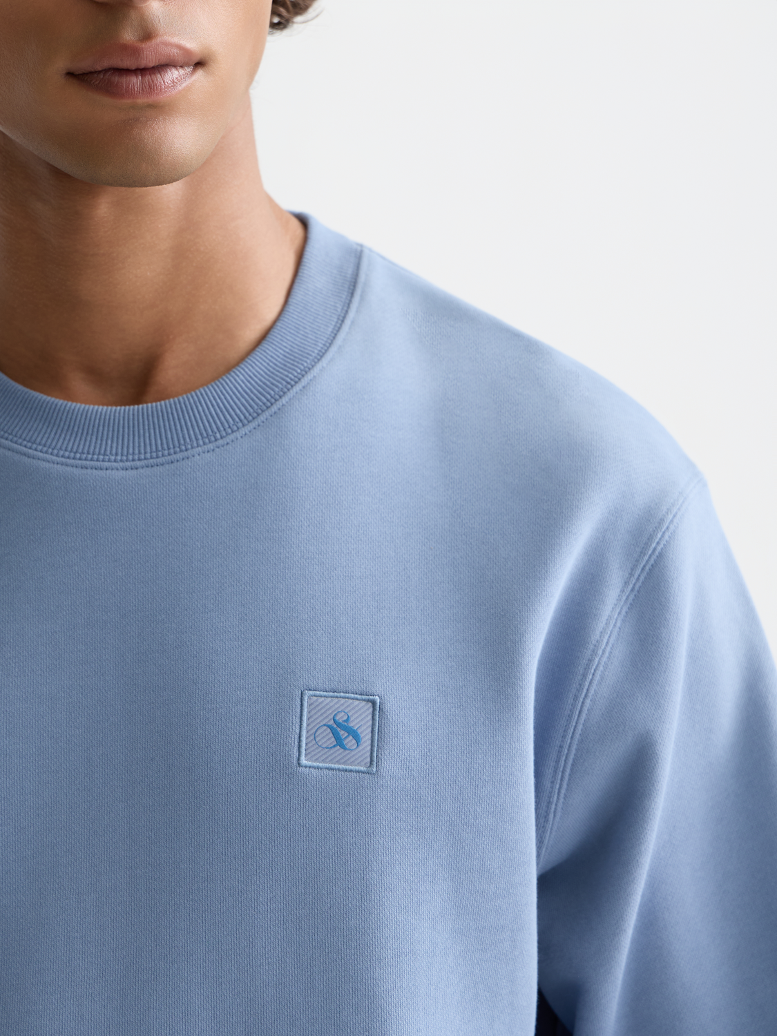 Seasonal Essentials logo badge sweatshirt