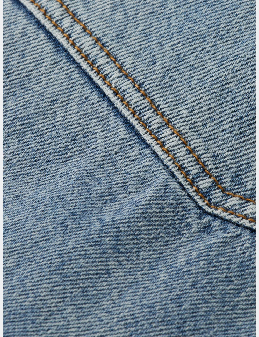 Washed Denim Ranch Jacket detail shot of fabric and craftsmanship by Scotch & Soda