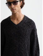 V-neck Cable Loose-fit Pullover detail shot of fabric and craftsmanship by Scotch & Soda