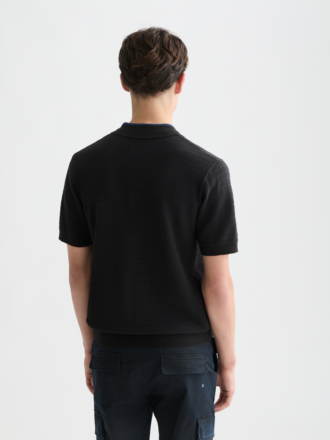 Structured knitted polo