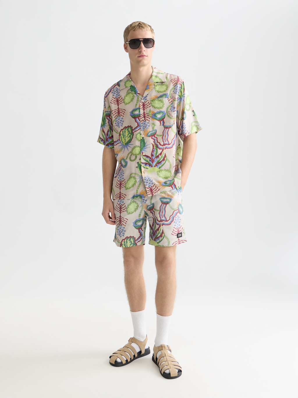 Printed mid-length swim shorts