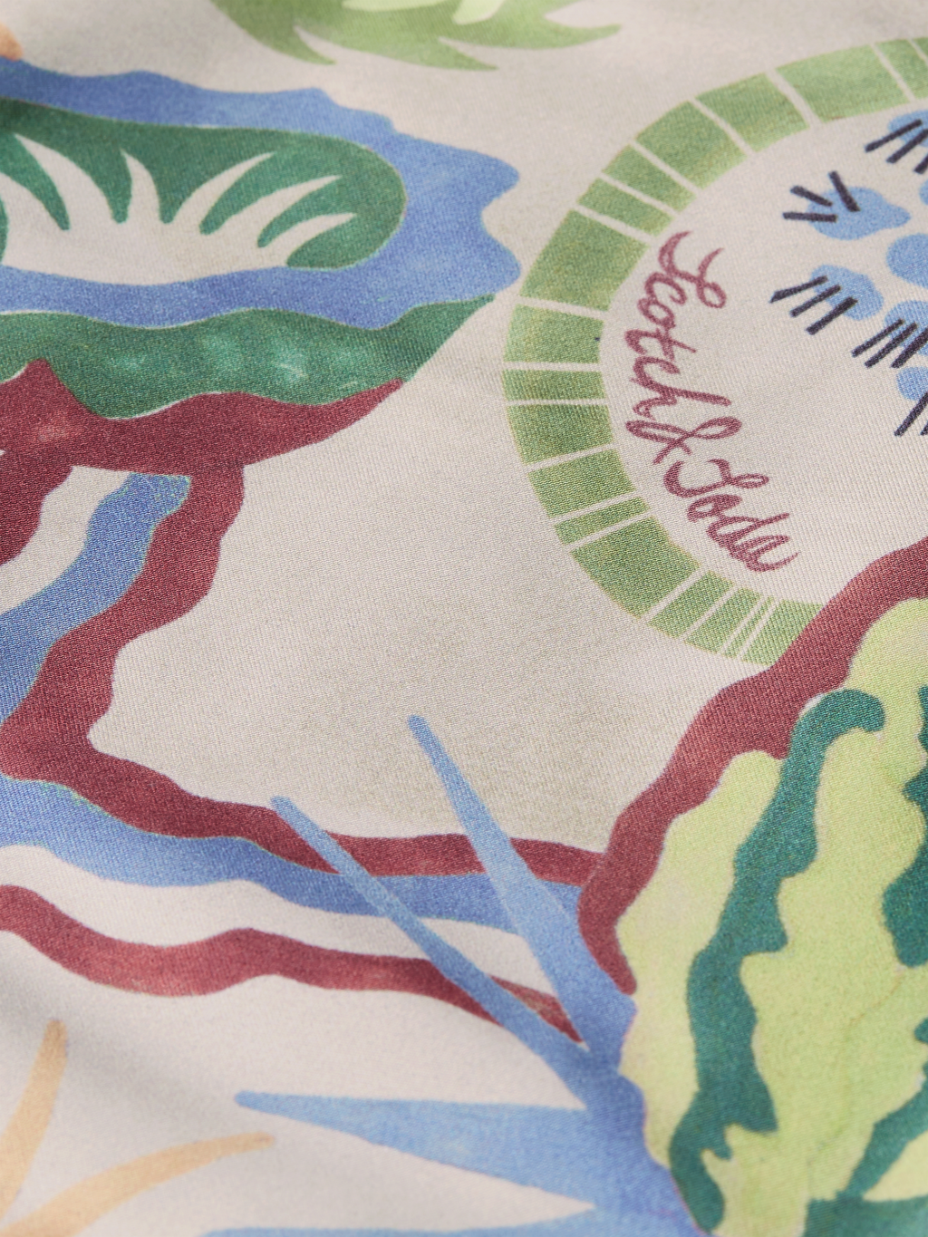 Printed mid-length swim shorts