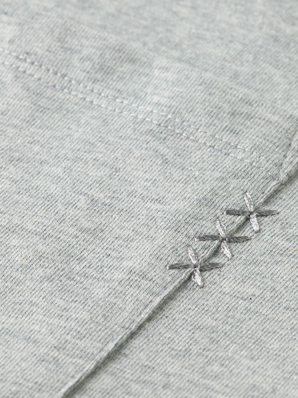 Seasonal Essentials 3 crosses pocket loose T-shirt