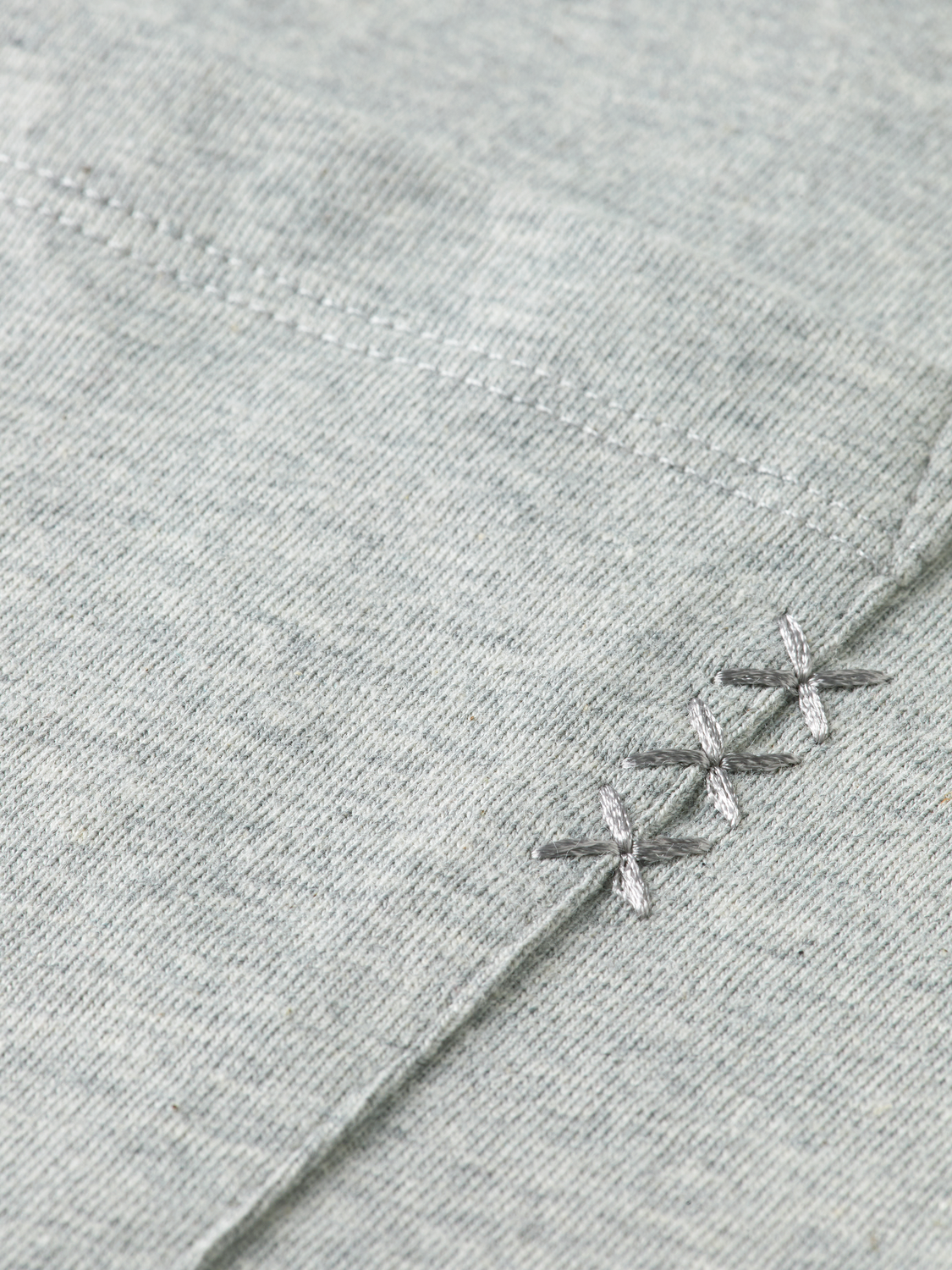 Seasonal Essentials 3 crosses pocket loose T-shirt