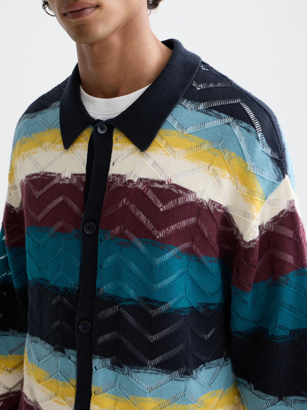 Open structure knitted cardigan