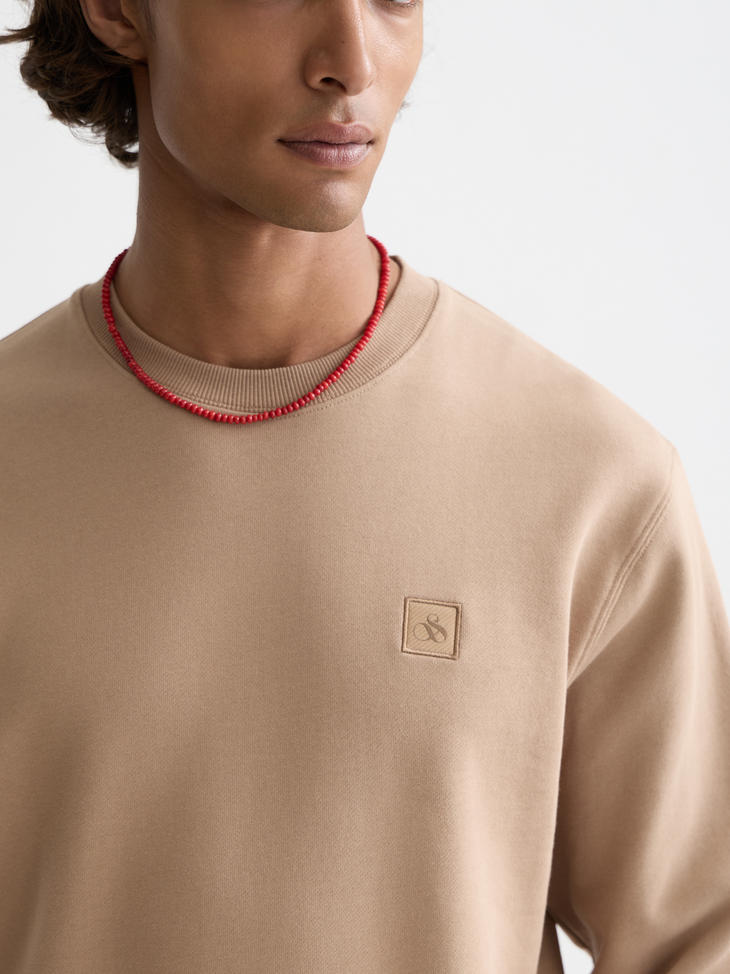 Seasonal Essentials logo badge sweatshirt