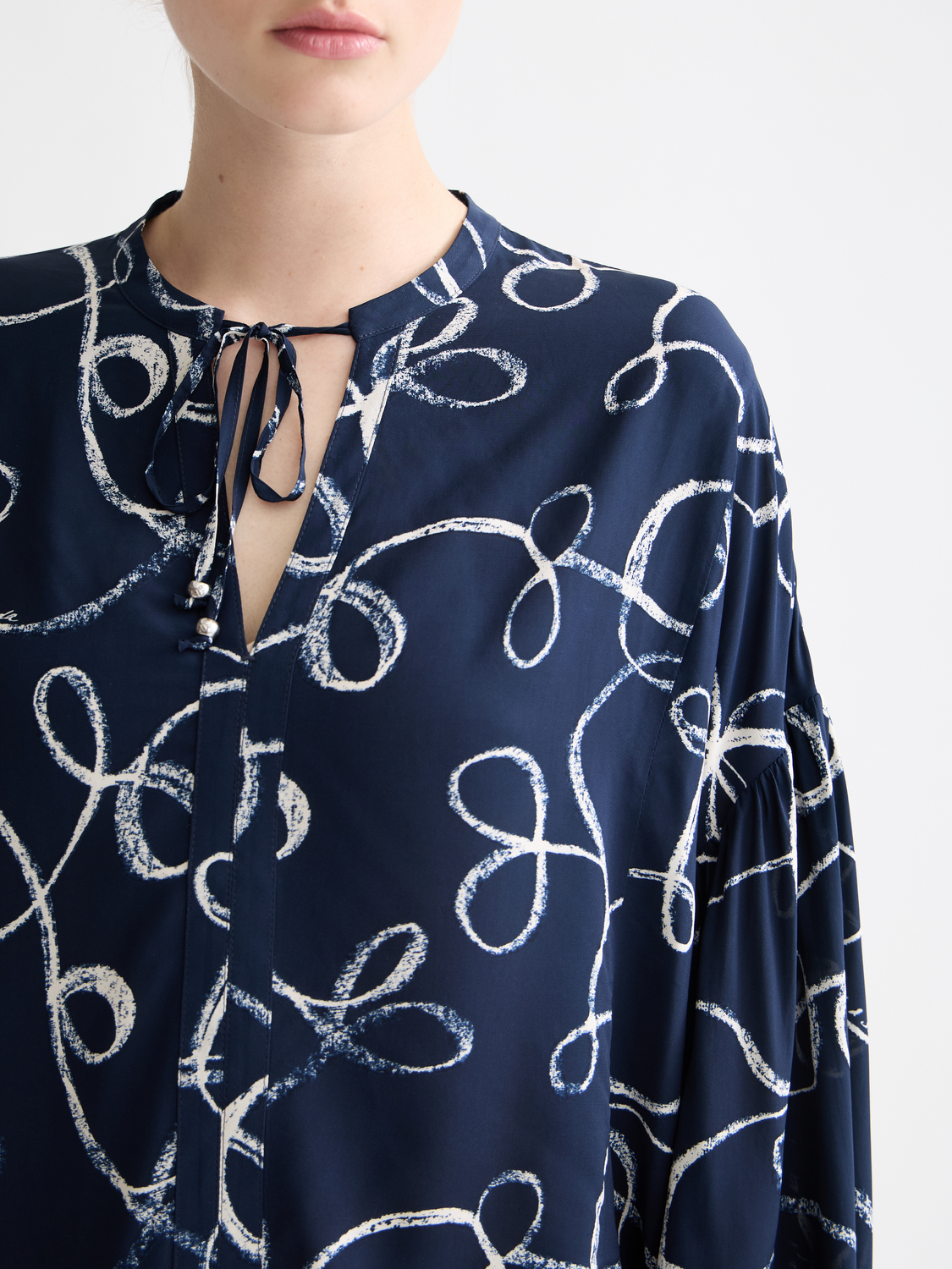 Easy top with draw string cuffs