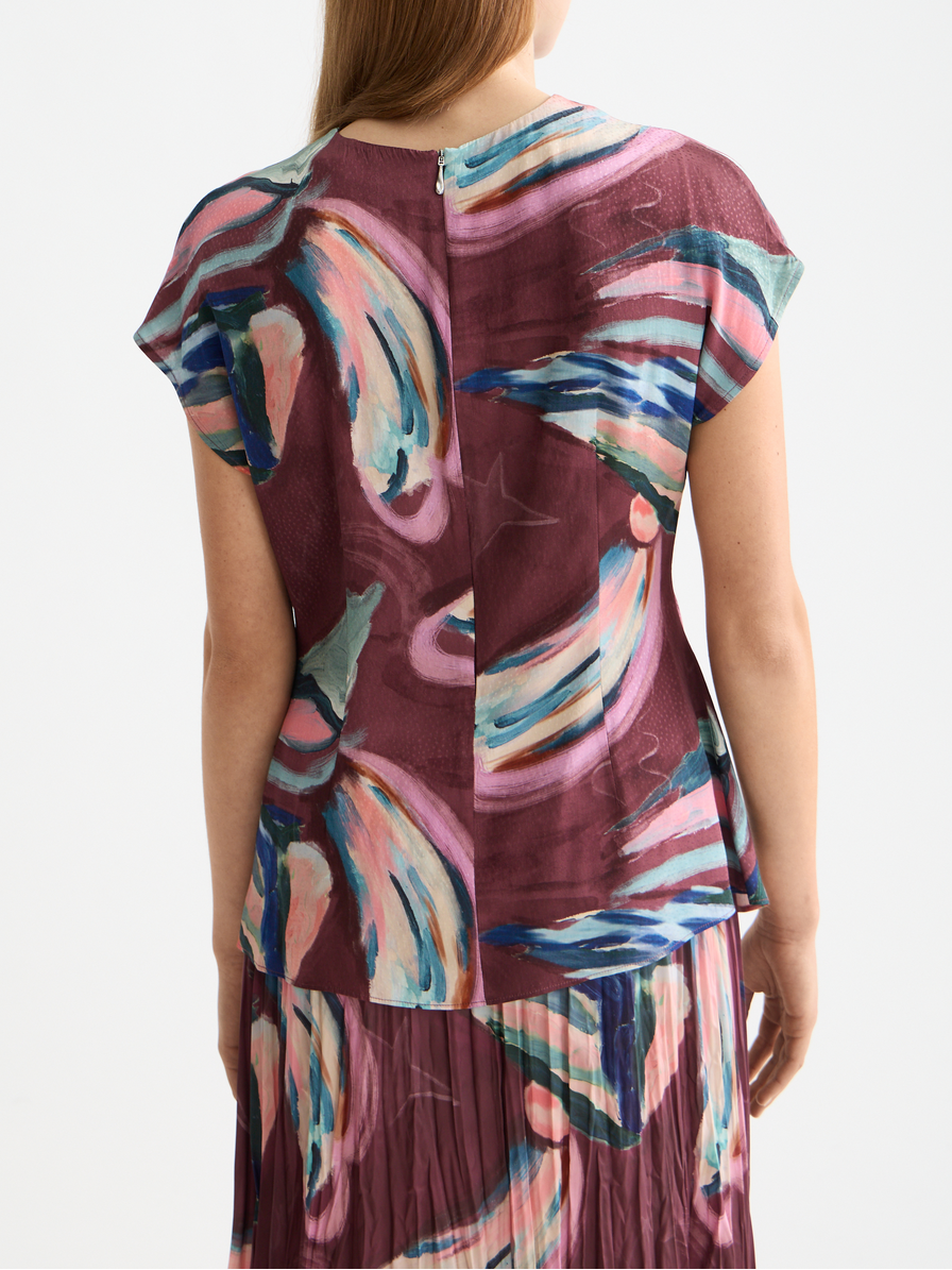 Draw string keyhole top