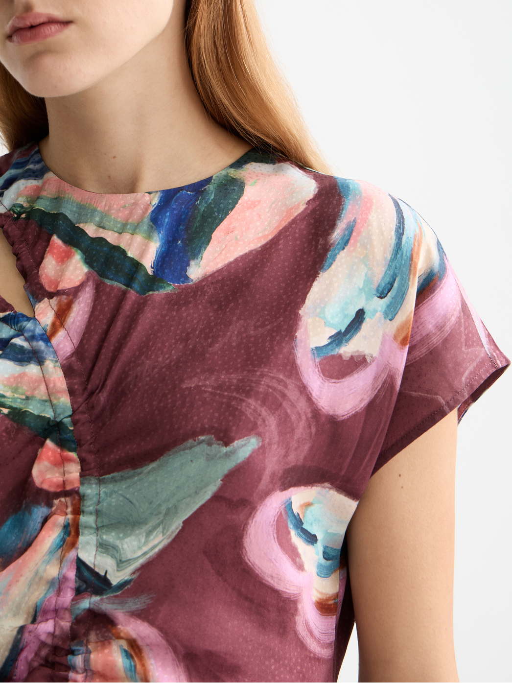 Draw string keyhole top