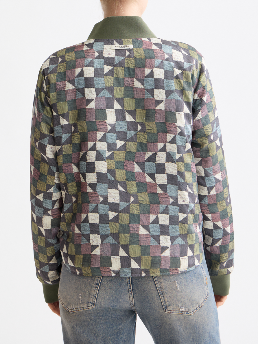 Reversible quilted bomber