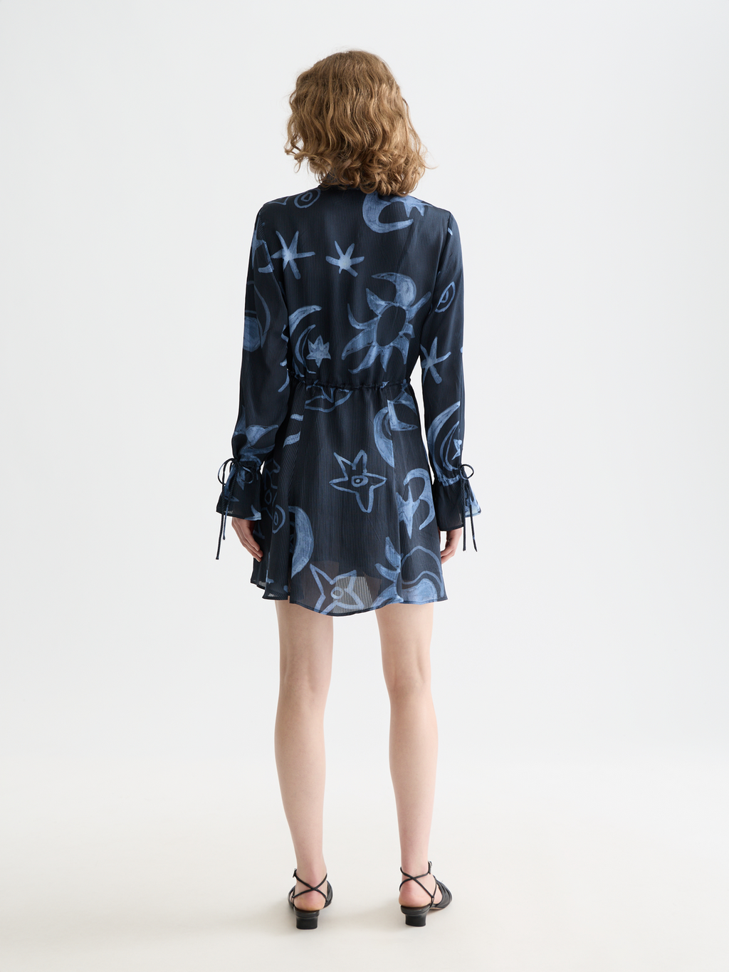 Printed long sleeved mini dress
